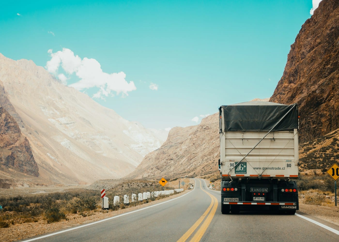 Delivery trucks on a highway